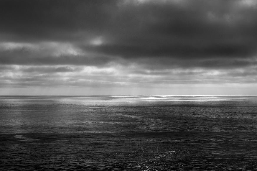Sun and clouds on the coast Sun dapples the ocean in Norhern California