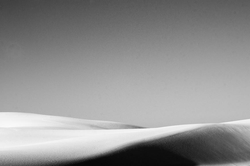 White Sands 2012 16 Black and White gypsum sand dunes under a cloudless sky New Mexico